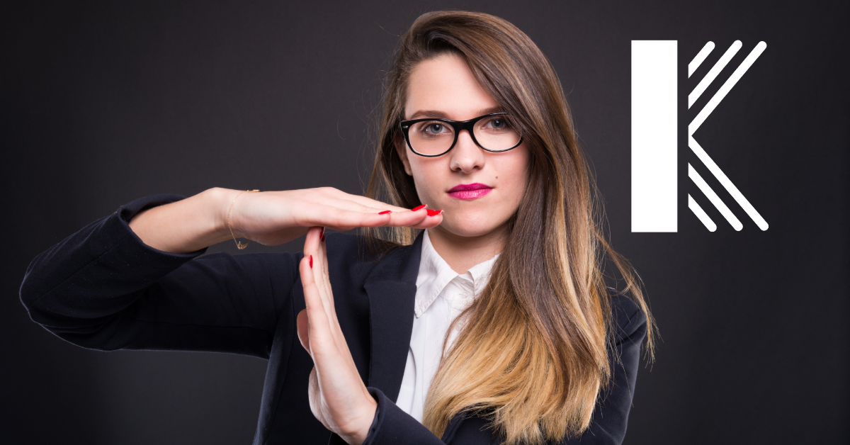 Female lawyer raising her hands up in an interruption gesture to symbolize business interruption with Kastner logo displayed to the right