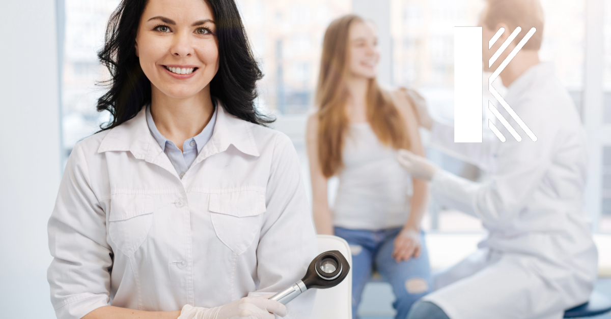 Female dermatologist with patient and assistant in background with Kastner insurance logo