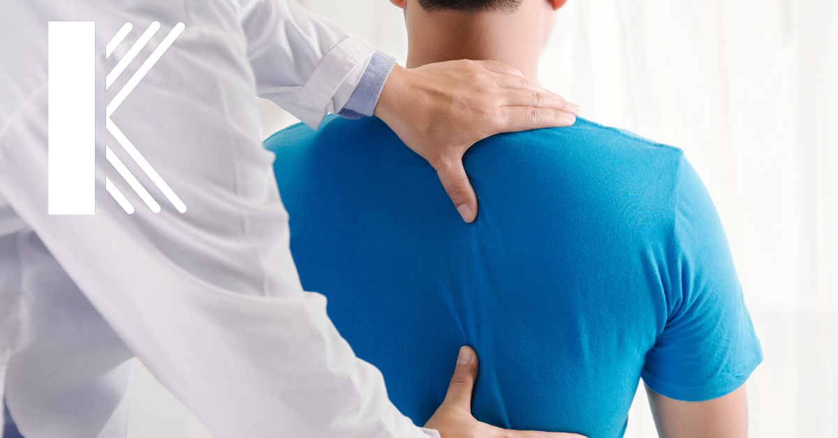 A chiropractor wearing a white coat places their hands on the back of a patient wearing a blue shirt, performing an adjustment or examination. The logo for Kastner Insurance is visible on the left side of the image.