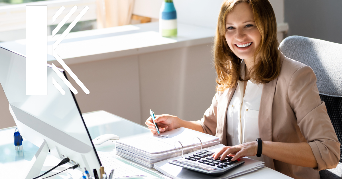 Baton Rouge Accountant at desk with Kastner Insurance Logo at top left