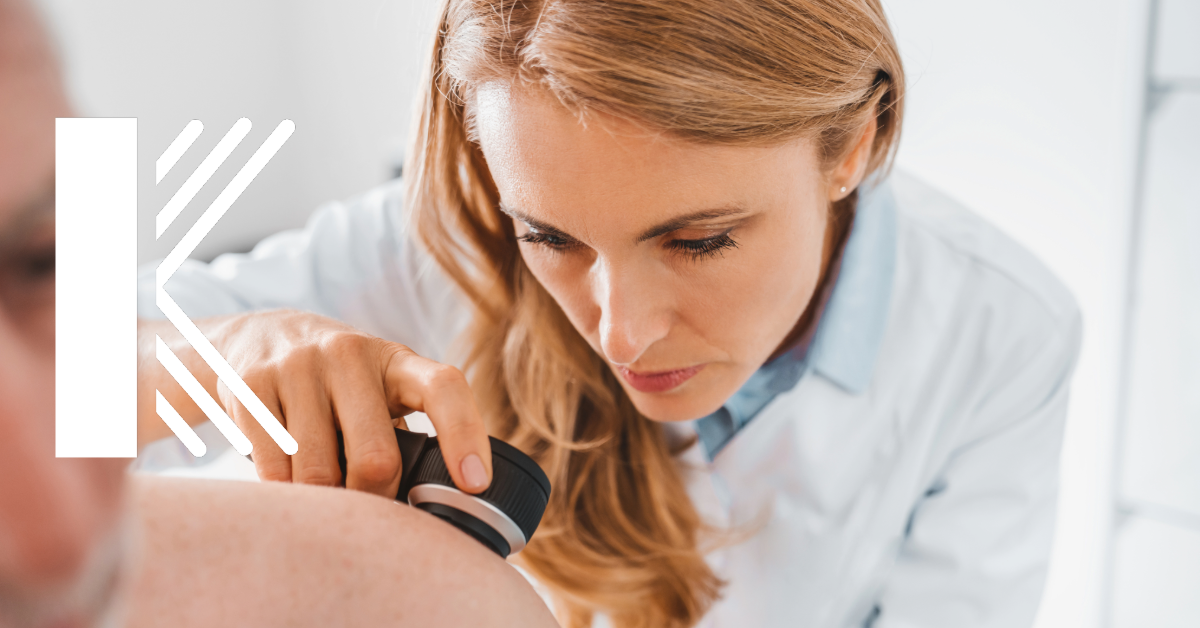 Baton Rouge dermatologist inspecting a client 