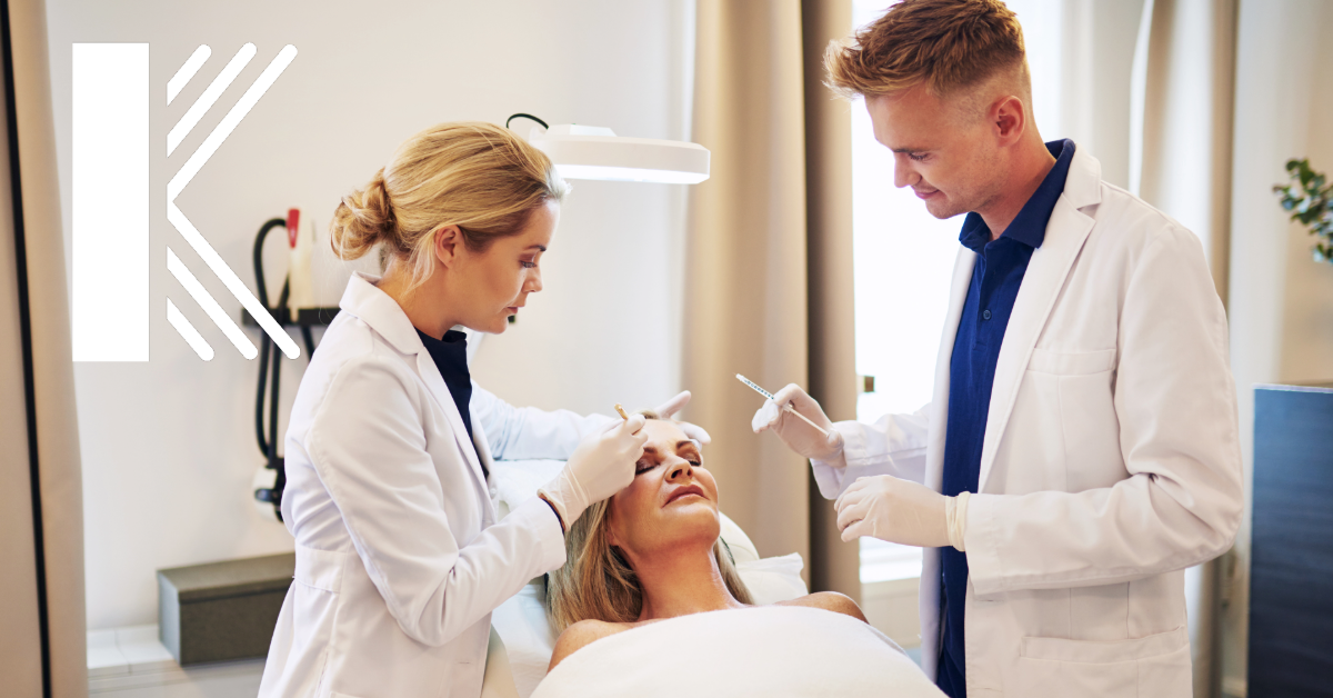 Two dermatology employees assisting a patient in a dermatology office in Baton Rouge Louisiana 